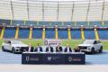 Konferencja prasowa na terenie stadionu. 