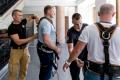 Pracownicy i przedstawiciele służb mundurowych podczas ćwiczeń. 