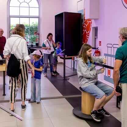 Lively interactive exhibit at INDUSTRIADY festival, celebrating industrial heritage of Silesia. (wygenerowano przez AI)