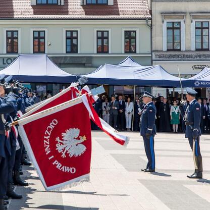 2023 Wroclaw Voivodeship Police Day celebrations on Rybnik's market square. Uniformed police officers in formation, flags with Polish eagle emblem and 