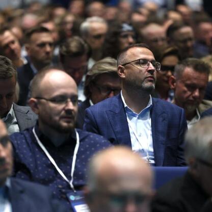Audience listens attentively to a speaker at the Energy Days 2025 conference in Katowice. (wygenerowano przez AI)