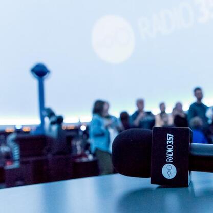 Live broadcast from Radio 357 at Planetarium Śląskiego, blending music, science, and visual spectacle. (wygenerowano przez AI)
